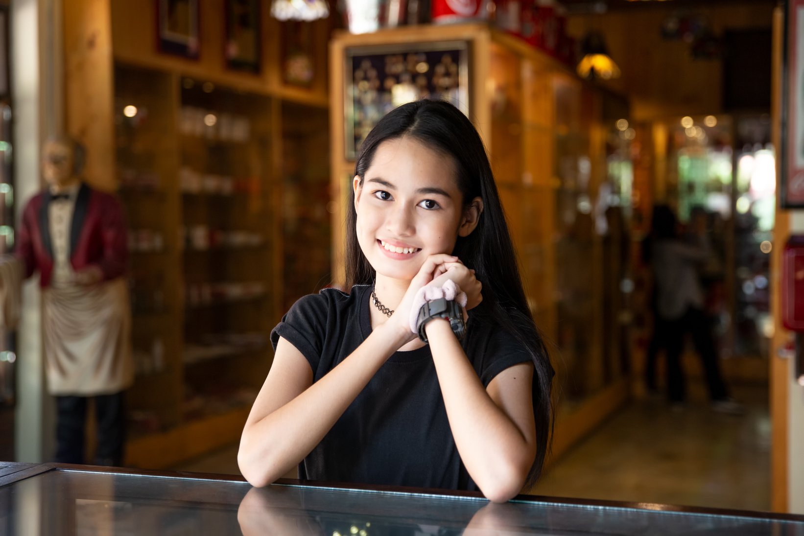 Portrait of a Teenage Girl Smiling Indoors