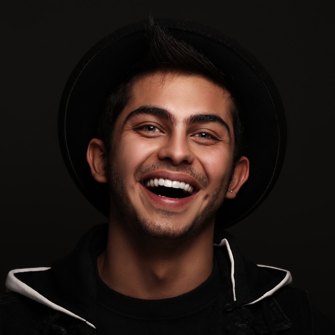 Portrait of a Man with a Hat Smiling